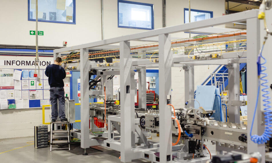 Employee working on machinery