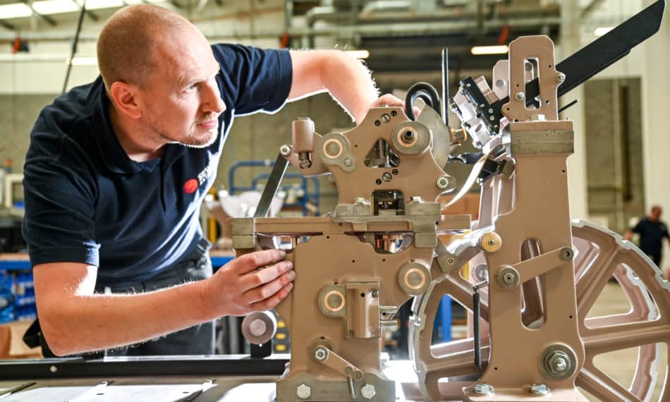 Engineer looking at an automated machine